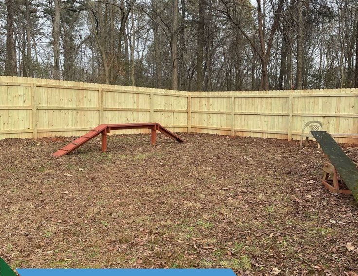 New fence and dog run built by Bear Mountain Painting for the Humane Society of Forsyth County