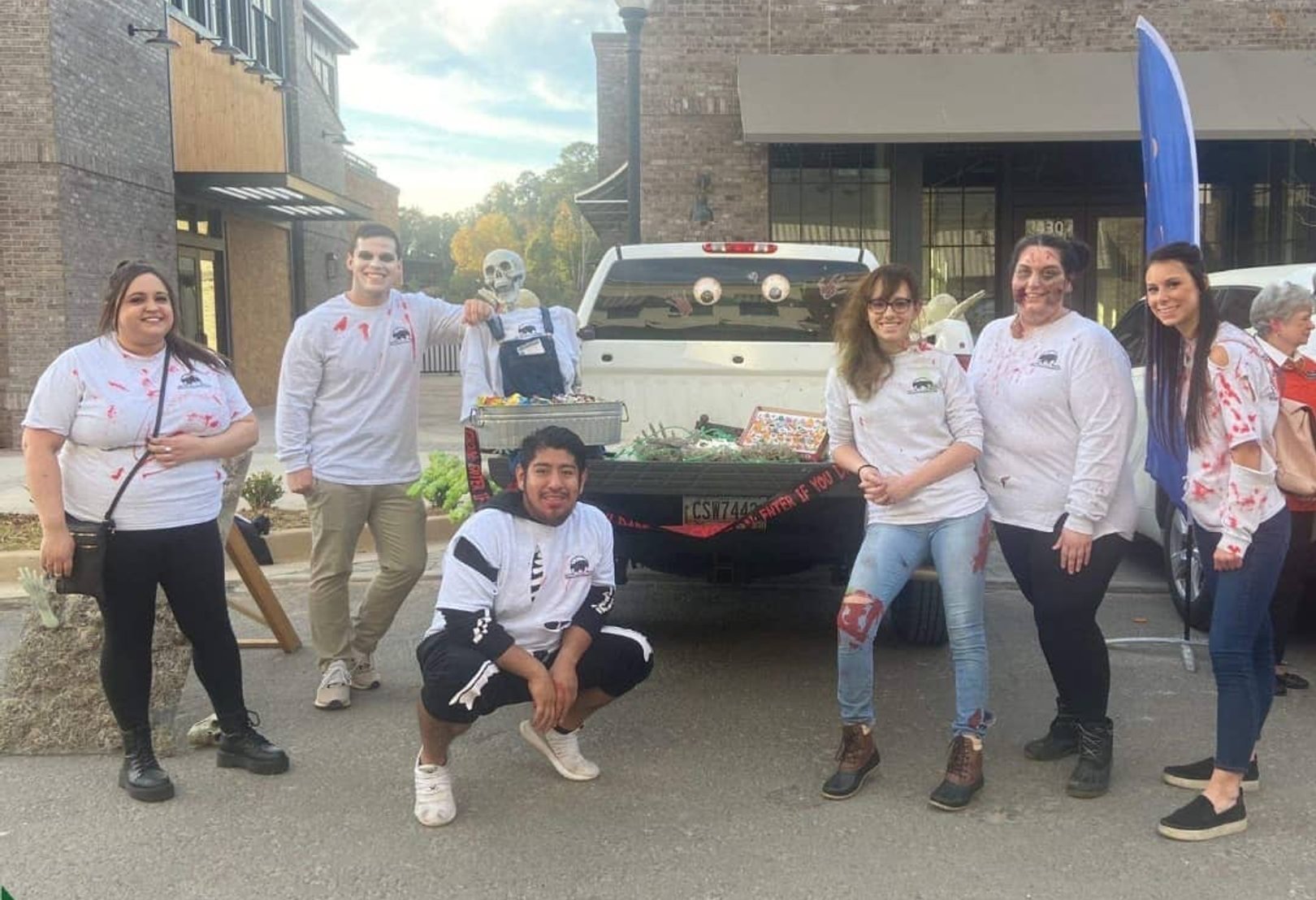 Bear Mountain Painting team in Halloween costumes at Forsyth County Trunk or Treat event
