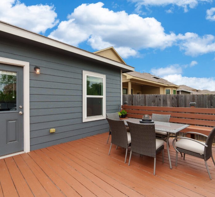 Deck and fence painting project by Bear Mountain Painting