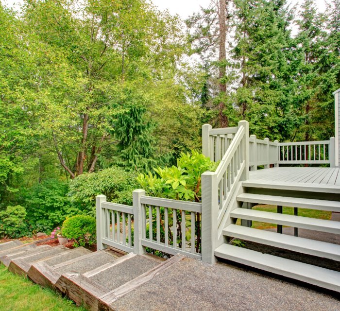 Deck and fence painting project by Bear Mountain Painting
