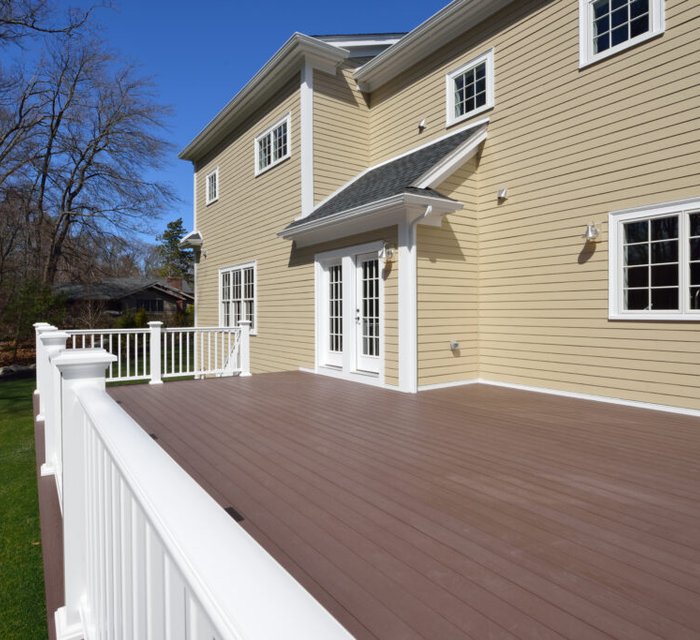 Deck and fence painting project by Bear Mountain Painting
