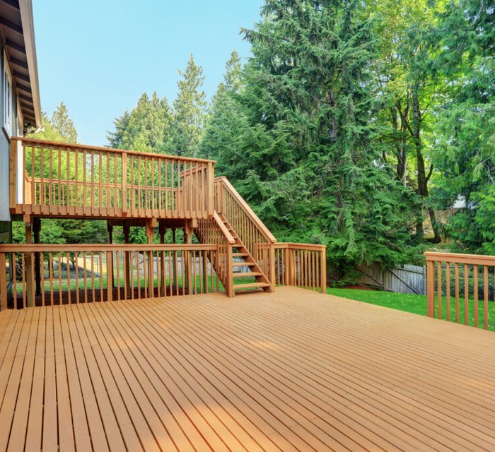 Deck and fence painting project by Bear Mountain Painting