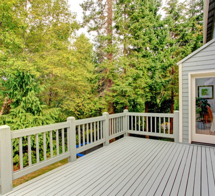Deck and fence painting project by Bear Mountain Painting