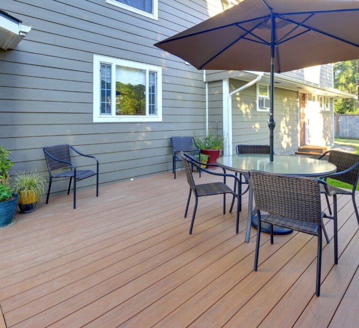 Deck and fence painting project by Bear Mountain Painting