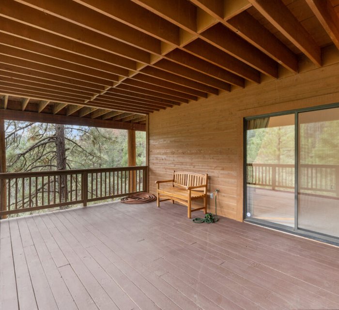 Deck and fence painting project by Bear Mountain Painting
